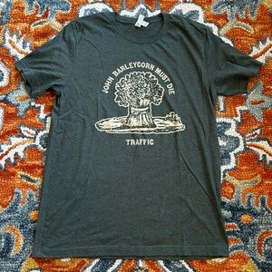 Traffic Steve win wood John barleycorn must die t shirt. Hunter green I think